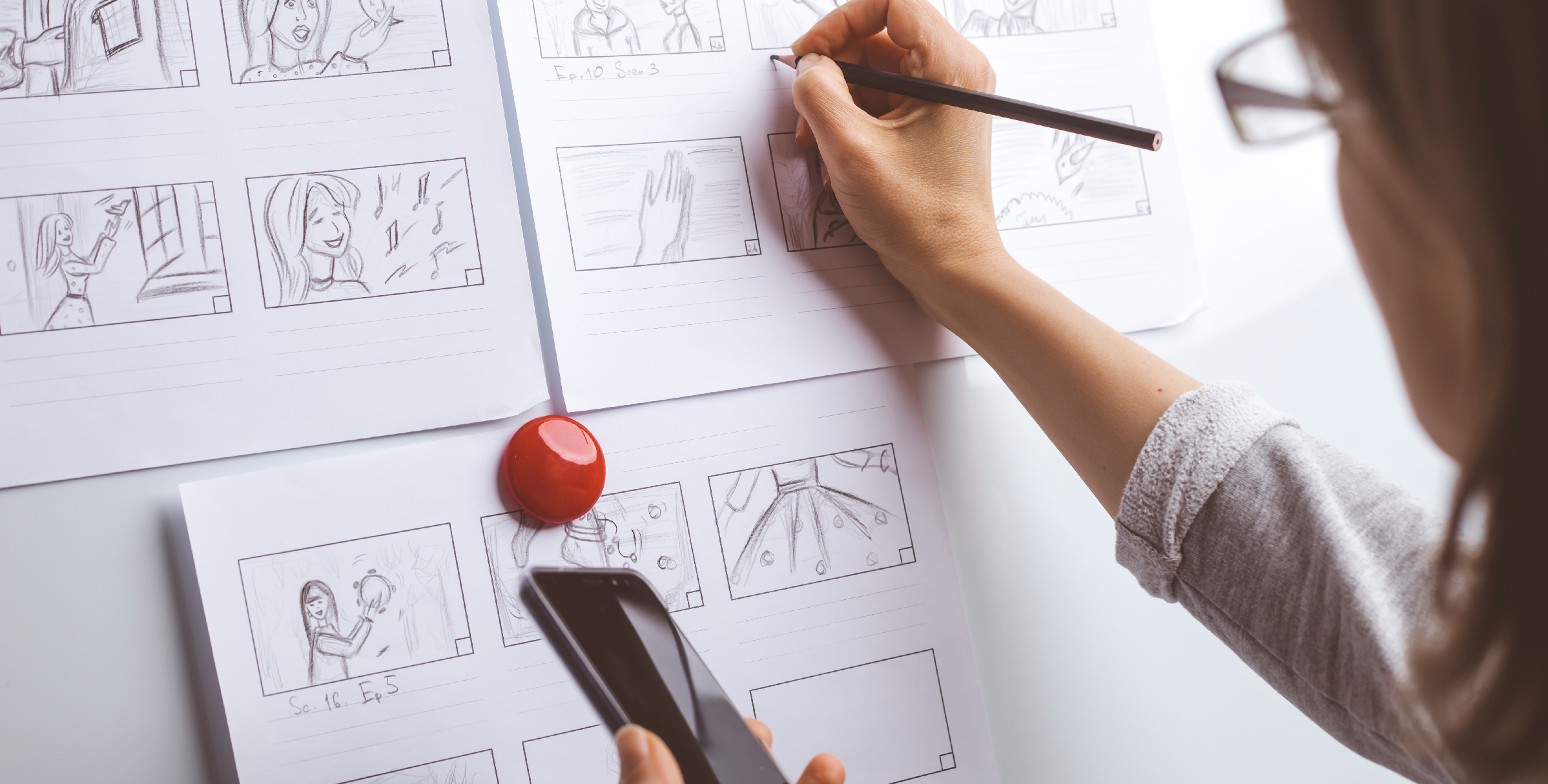 Woman drawing a story board